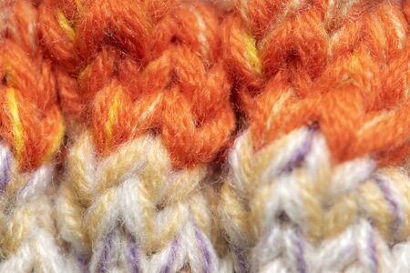 Background of the wool yarn. Woolen fabric texture closeup. Textile texture background. Detailed warm yarn background.の写真素材