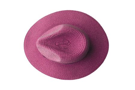 Top view pink pretty straw hat isolated on white backgroundの写真素材