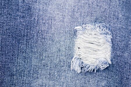 old blue jeans. denim jeans texture backgroundの写真素材