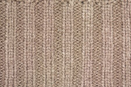 Background of the wool yarn. Woollen fabric texture closeup. Textile texture background. Detailed warm yarn background.の写真素材