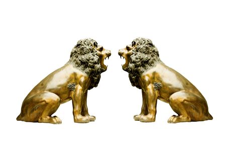 Brass metallic sculpture of two Lion isolated on white backgroundの写真素材