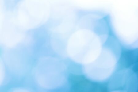 Defocused Bokeh Festive background with natural bokeh and bright lights.の写真素材