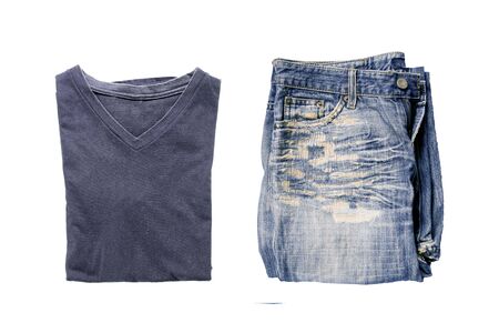 Top view of blue t-shirt V-shaped collar and Old jeans on a white backgroundの写真素材