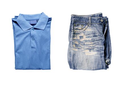 Top view of blue polo shirt and Old jeans on a white background.の写真素材