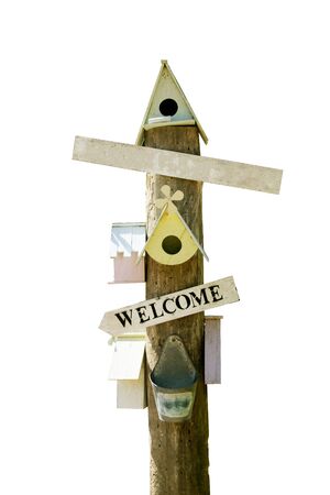 Bird house and Wooden sign isolated on white. Wood planks sign isolatedの写真素材