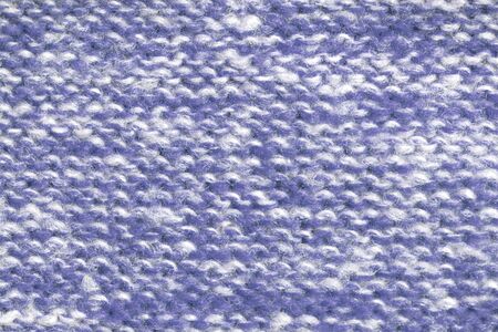 Background of the wool yarn. Woolen fabric texture closeup. Textile texture background. Detailed warm yarn background.の写真素材