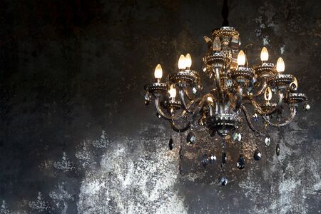 Vintage lantern hang on the Grunge metal wallの写真素材