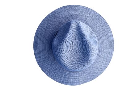 Vintage pretty straw hat isolated on white background. Top view.の写真素材