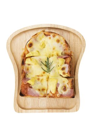 Hot Toasted bread with ham and cheese on wood plate on white background, top view.の写真素材