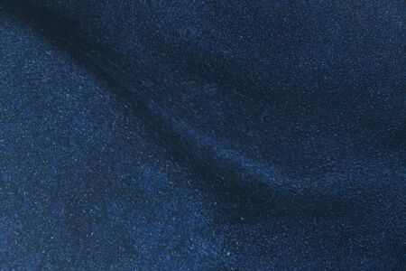 Fantasy bokeh glitter dust on dark magic background.の写真素材
