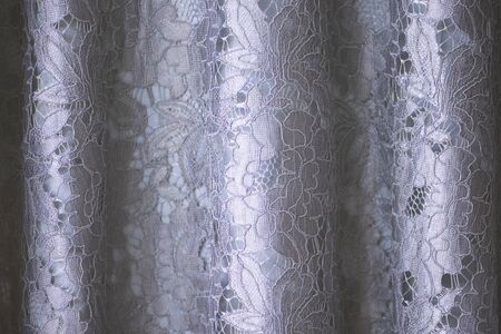 Lace fabric background, gray lace fabricの写真素材