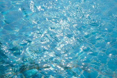 blue swimming pool,background of water in swimming pool.の写真素材