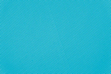 White dot on blue Texture Backgroundの写真素材
