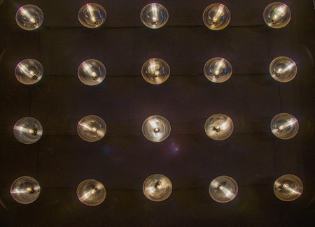 damaged brick wall with bulbsの写真素材