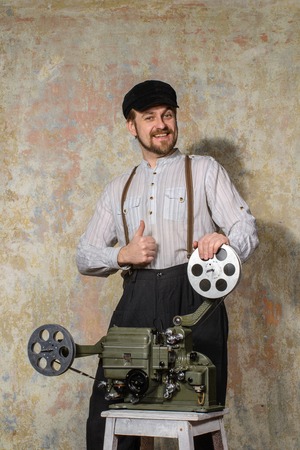 young beard projectionist man going thumb upの写真素材