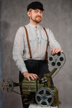 Cameraman with with a film projection