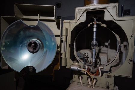Angled 35mm movie projector images in projecting roomの写真素材