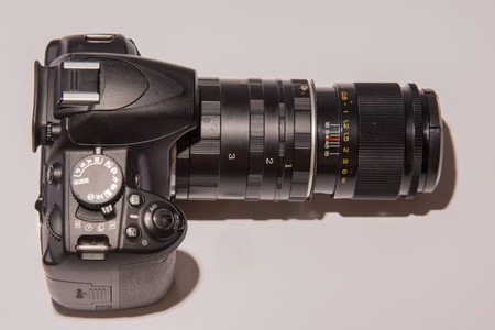 camera with a macro lens on  white backgroundの写真素材