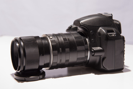 camera with a macro lens on  white backgroundの写真素材
