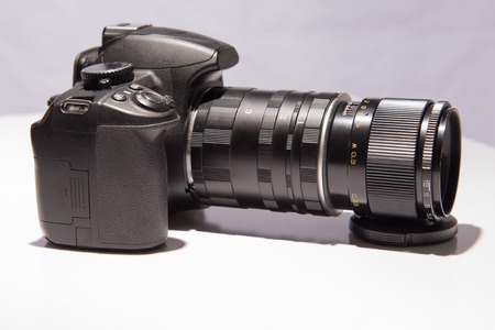 camera with a macro lens on  white backgroundの写真素材