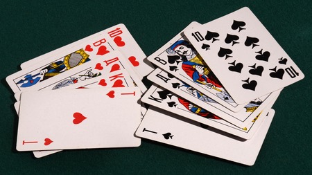 royal flush of playing cards on the table.