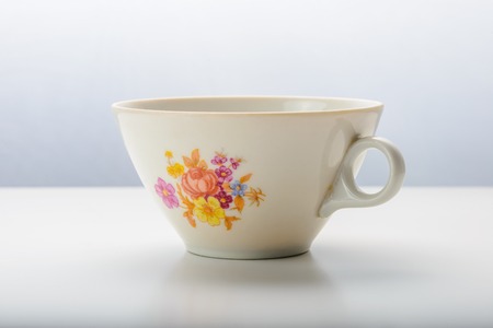 White cup isolated on white backgroundの写真素材