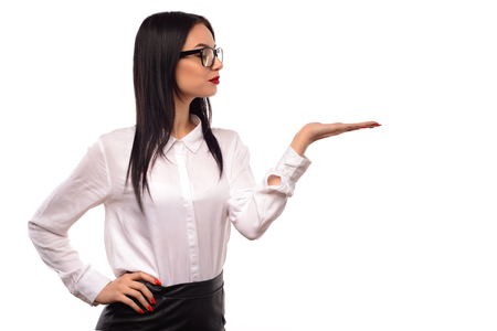 Stylish attractive young business woman presenting Isolated.の写真素材