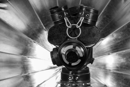 Close up bdsm outfit. Bondage, kinky adult sex games, kink and BDSM lifestyle concept with gas maskon the mannequin head.の写真素材