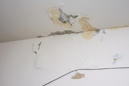 Damage ceiling from water pipelines leakage. Housing problem concept - imageの写真素材