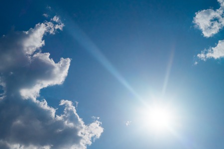 The sun shines bright in summer. Blue sky and clouds.- imageの写真素材