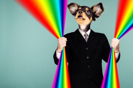 Psychedelic collage combining a man in a suit and a dog's head. The character holds a rainbow in his hands and looks up. The mouth is open in surprise. - imageの写真素材