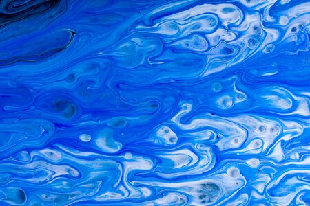 Abstract texture of liquid acrylic art. Part of image.