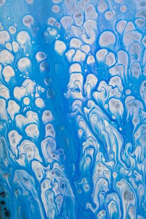 Abstract texture of liquid acrylic art. Part of image.