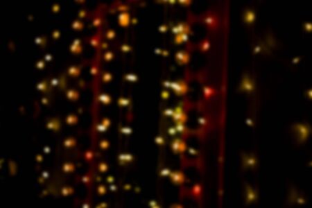 Christmas home room with tree and festive bokeh lighting, blurred holiday background. Template