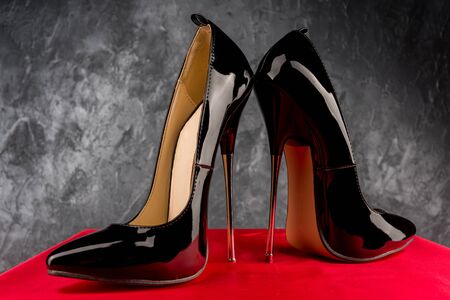 Black fetish shiny patent leather stiletto high heels with ankle strap - imageの写真素材