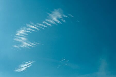 Incredibly beautiful clouds against a sunny blue sky. - Image