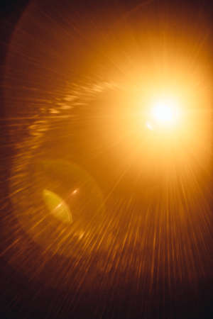 Abstract Natural Sun flare on the black.の写真素材