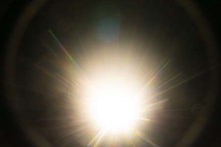 Abstract Natural Sun flare on the black.