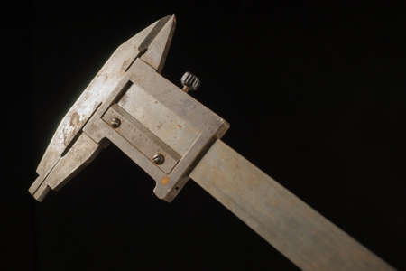 Old tools in front of a black backgroundの写真素材
