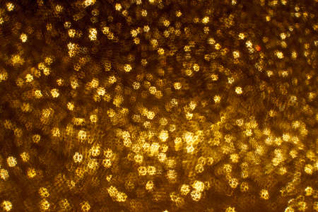 Christmas background. Festive abstract background with bokeh defocused lights and stars.の写真素材