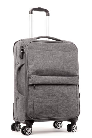 Travel gray suitcase isolated on white background.の写真素材