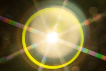 Abstract sun flare. The lens flare is subject to digital correction.