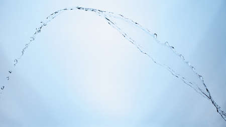 beautiful splashes a clean water on blue gradient background.の写真素材