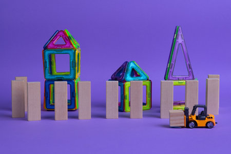 Construction site, loader carries a cubeの写真素材