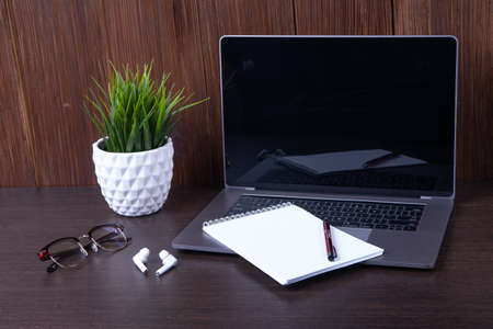 Working with a laptop computer with a connection to a webinar to view e-business, business concept