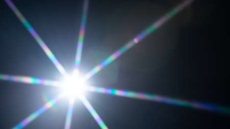 Sun flare on the black background