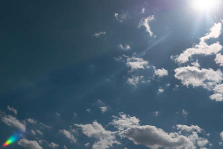 sun shining above beautiful stormy clouds, sky is clearing after rain