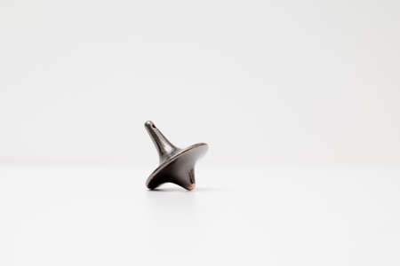 Totem spinning top spinning, wobbling and stopping. Inception's spinning top.