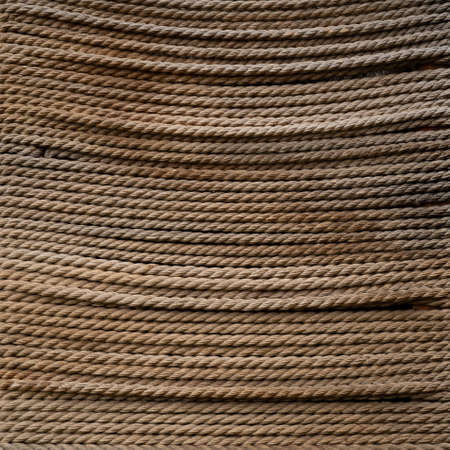 seamless tied rope in a row in parallel line background in closeup full frame.