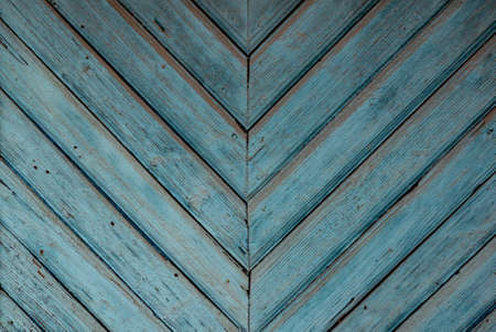 Vintage wood background with peeling paint.